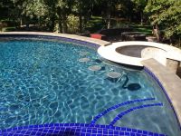 Pool with swim up bar